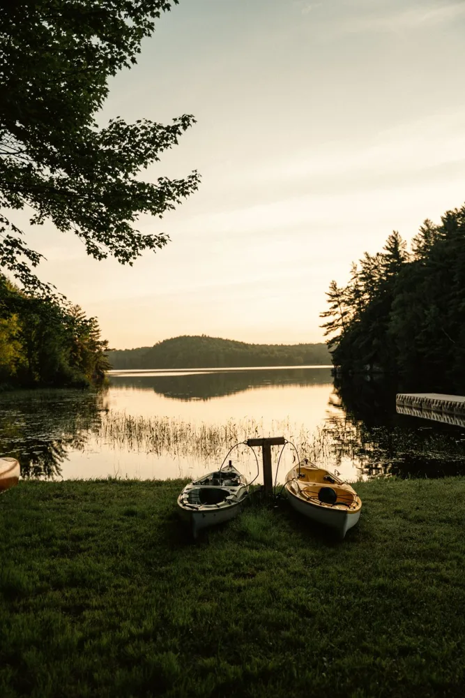 Kayaks beside a sunset lake in Restoule, an illustrative Ontario scene